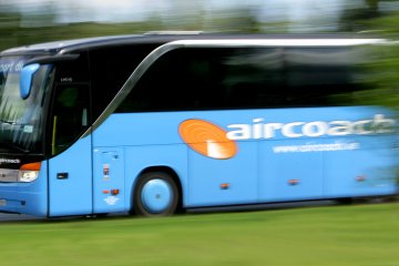 Aircoach travelling at speed, marketing photo.