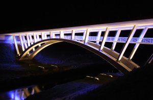 Bridge at Night, lit up, professional editorial photograph.