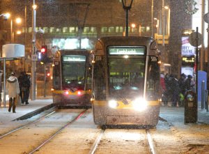 Luas Tram at Night in Snow, professional photograph.